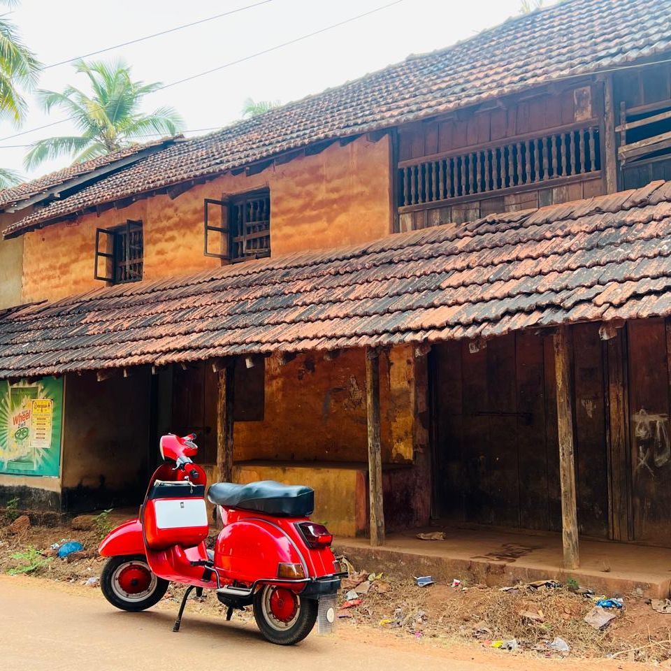 Vintage scooter on a village road