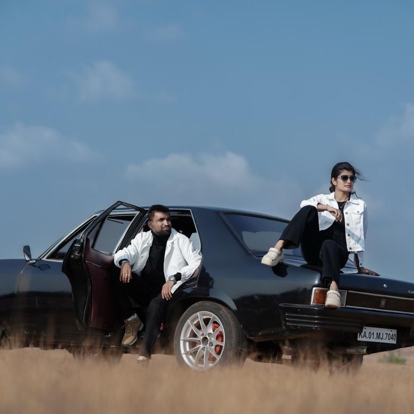 Passengers in the vintage car