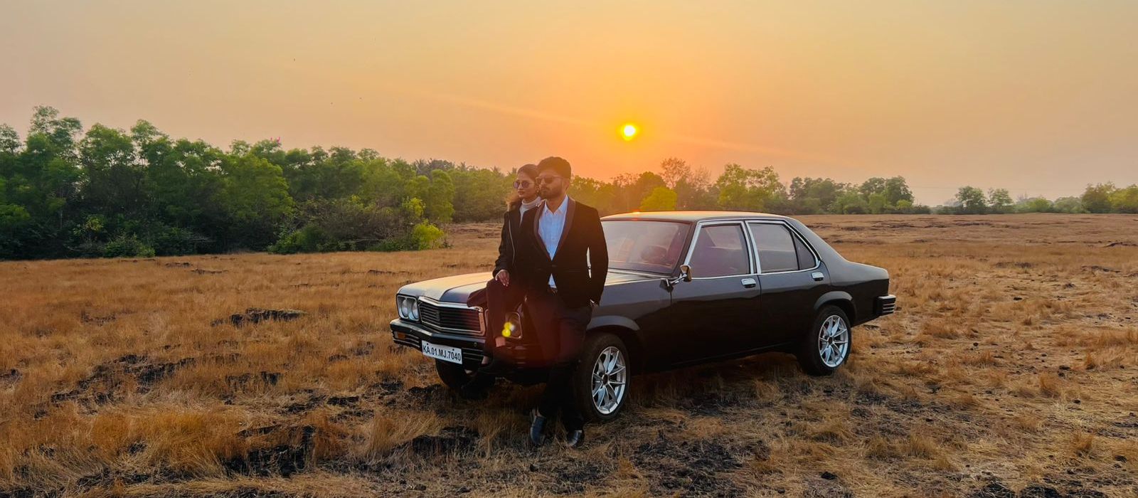 A Contessa Classic in an open field at sunset near Honnavar